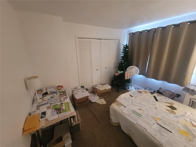 carpeted bedroom with a closet