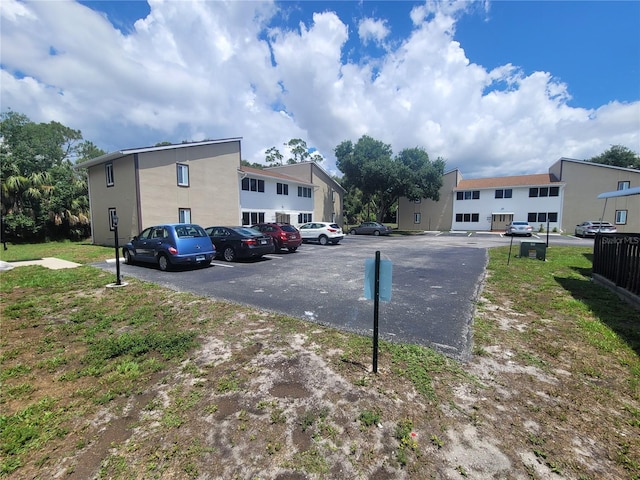 22481 Westchester Blvd Unit B40, Punta Gorda, FL 33980 - uncovered parking lot with a residential view