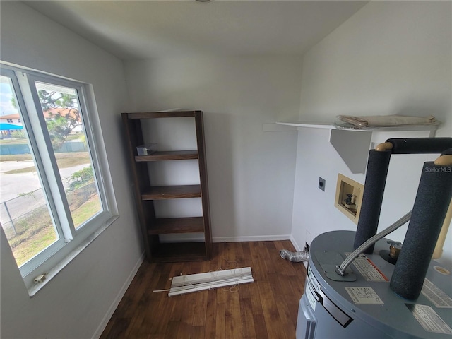 home office featuring a healthy amount of sunlight and dark hardwood / wood-style floors