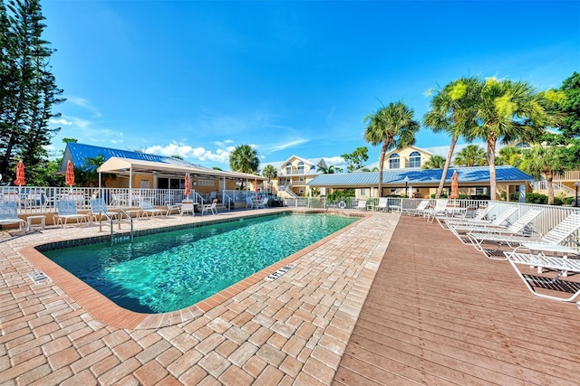 view of pool featuring a patio area