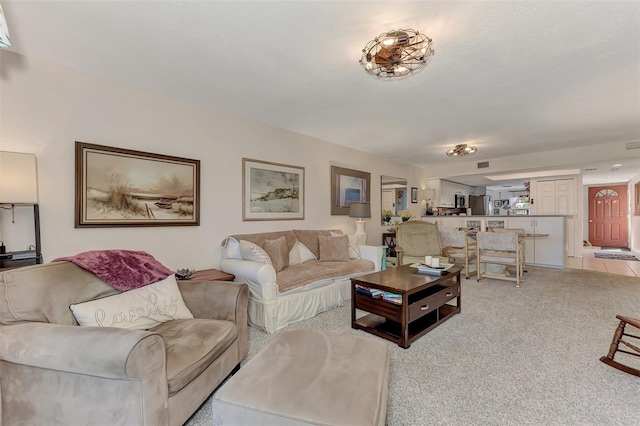 living room with light colored carpet