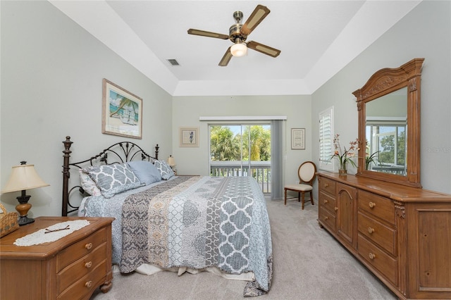 carpeted bedroom with access to outside and ceiling fan