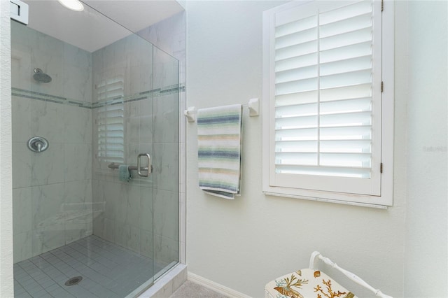 bathroom featuring walk in shower