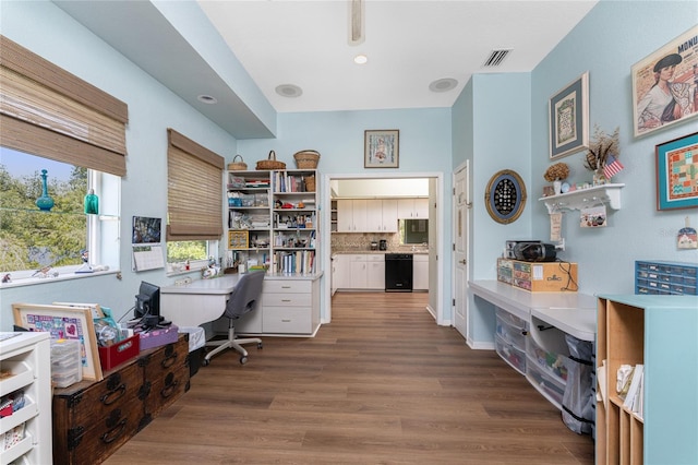 office with dark hardwood / wood-style floors