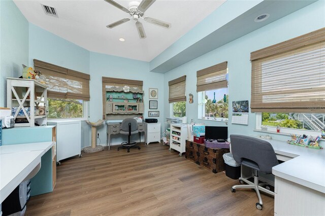 office featuring wood-type flooring and ceiling fan