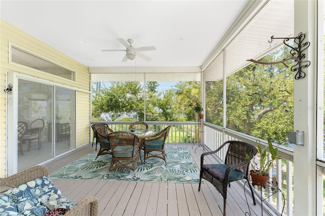 sunroom / solarium with ceiling fan