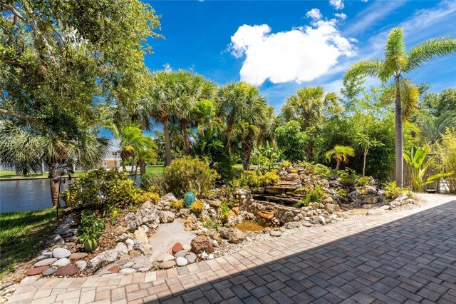 view of patio featuring a water view