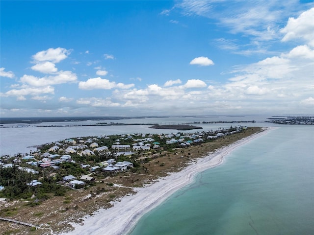 aerial view with a view of the beach and a water view