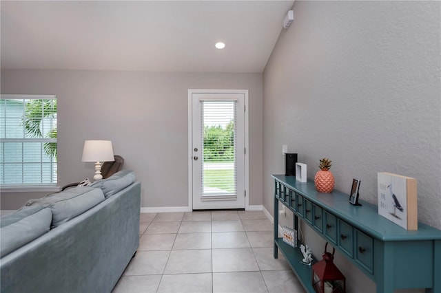 entryway featuring light tile patterned floors