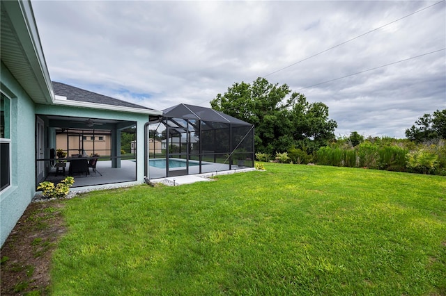 view of yard with a patio and a lanai