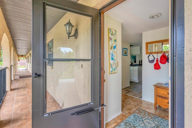 interior space with tile patterned floors