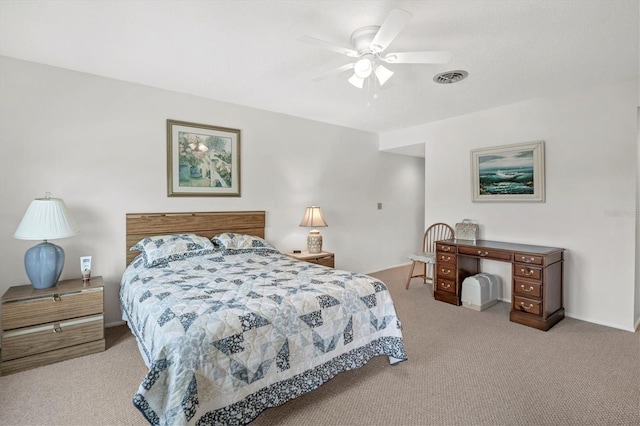 bedroom featuring light colored carpet and ceiling fan