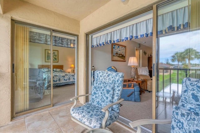 living area featuring light tile patterned flooring