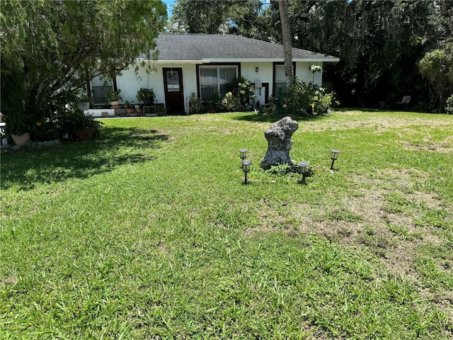 4029 E Sunflower Cir, Labelle, FL 33935 - view of front of property with a front yard