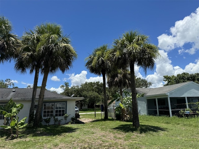 4029 E Sunflower Cir, Labelle, FL 33935 - view of yard with a sunroom