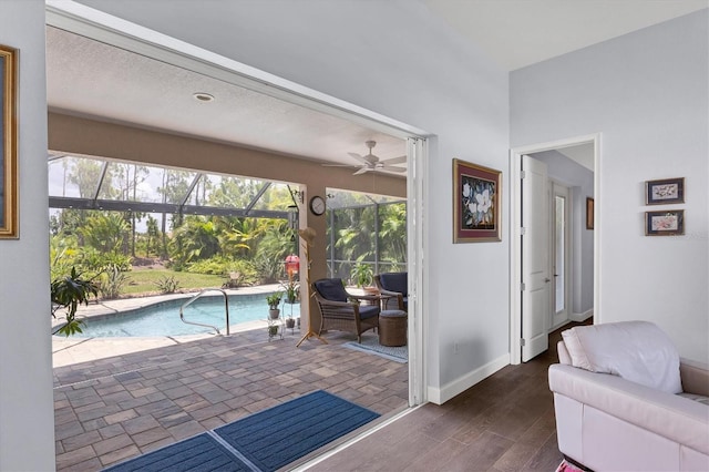 view of pool featuring ceiling fan