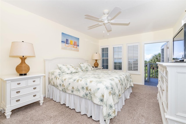 bedroom with access to exterior, light colored carpet, and ceiling fan