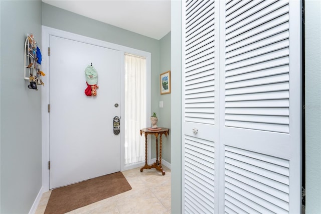 foyer with light tile patterned flooring