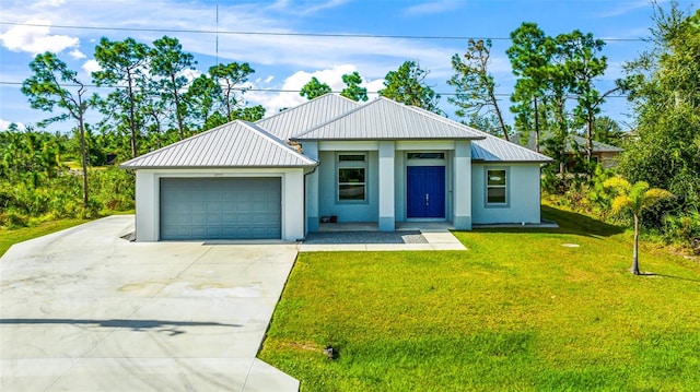 view of front facade featuring a garage and a front yard