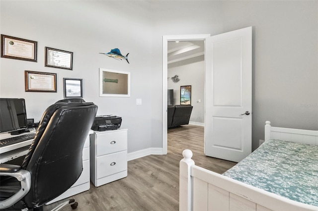 bedroom featuring light wood-type flooring