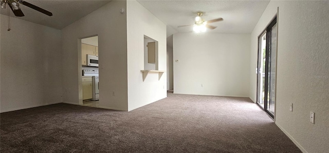 carpeted empty room featuring lofted ceiling and ceiling fan