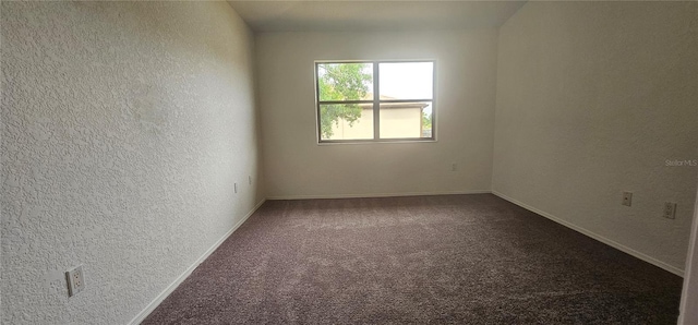 empty room with carpet floors