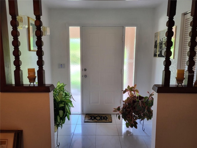 foyer featuring light tile patterned floors