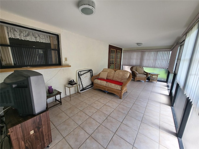 living room with light tile patterned floors