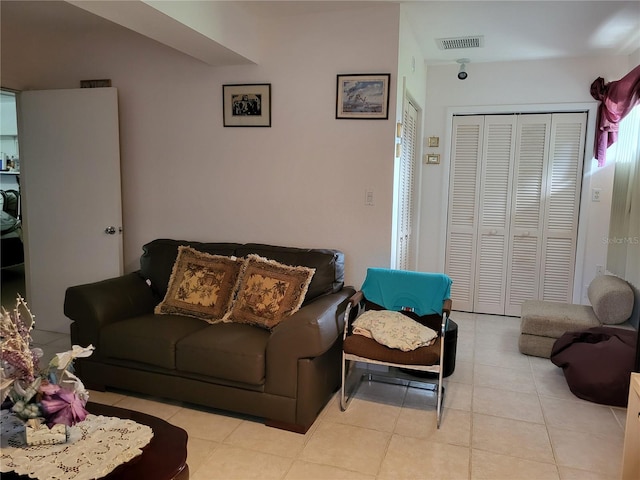 living room with light tile patterned floors