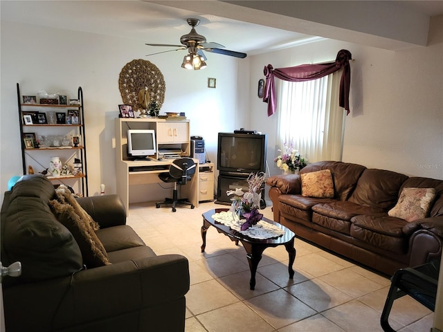 living room featuring ceiling fan and light tile patterned flooring