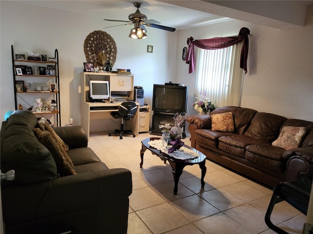 living room with ceiling fan and light tile patterned floors