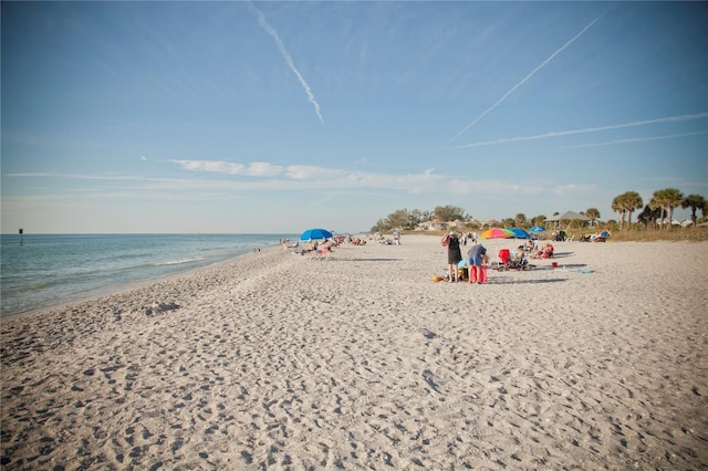 property view of water featuring a beach view