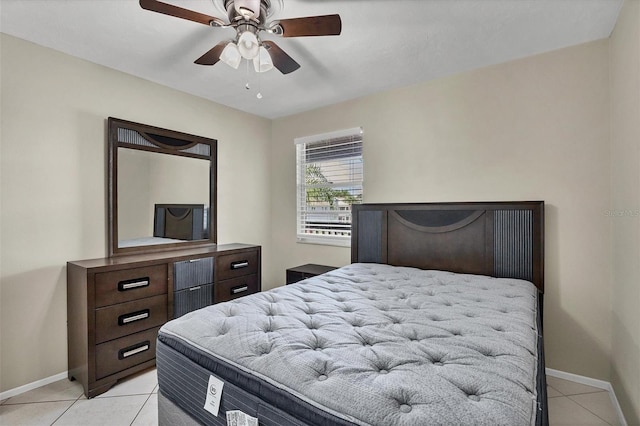 bedroom featuring ceiling fan and light tile patterned flooring