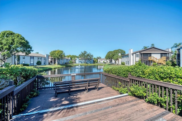 wooden terrace with a water view