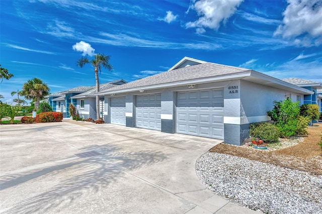 view of side of property featuring a garage