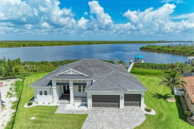 aerial view featuring a water view