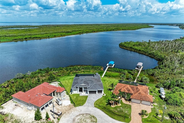 drone / aerial view with a water view