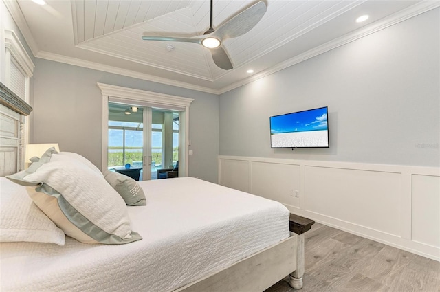 bedroom featuring access to exterior, ceiling fan, light hardwood / wood-style flooring, and ornamental molding