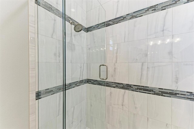 bathroom with an enclosed shower