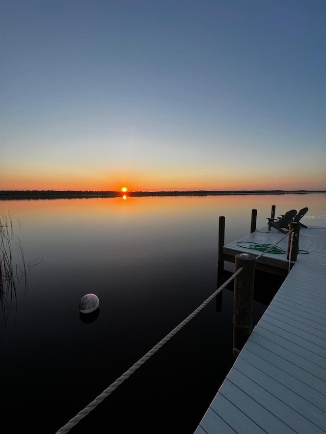 view of dock with a water view