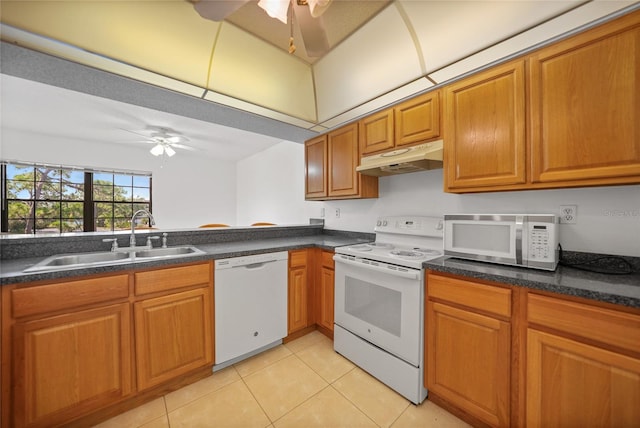 kitchen with kitchen peninsula, white appliances, ceiling fan, sink, and light tile patterned floors