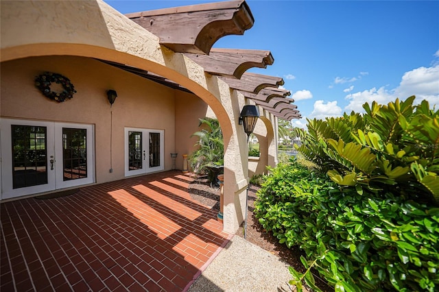 view of patio / terrace featuring french doors