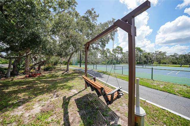 exterior space with tennis court