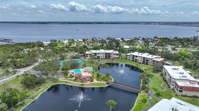 bird's eye view with a water view