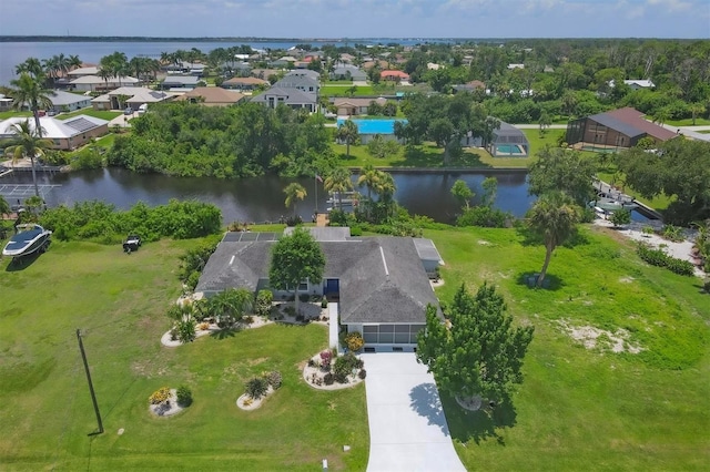 drone / aerial view with a water view