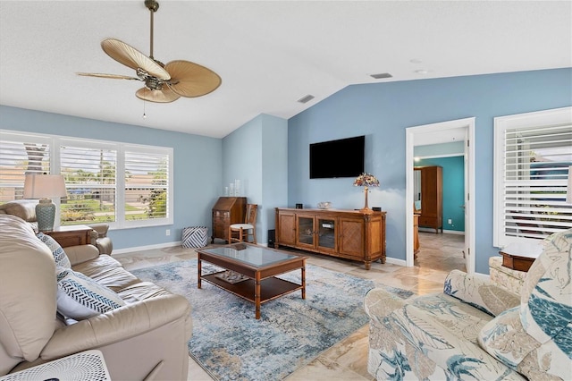 tiled living room with vaulted ceiling and ceiling fan