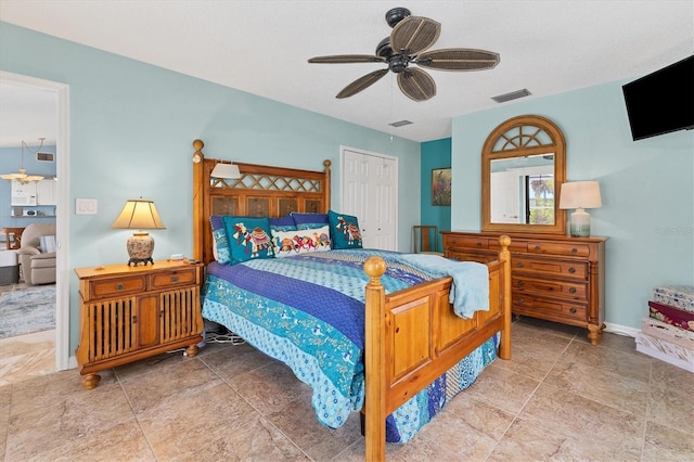 bedroom with a closet and ceiling fan