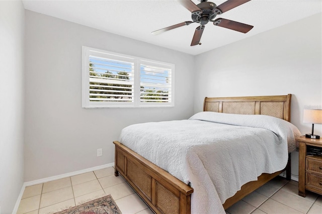 bedroom with light tile patterned floors and ceiling fan