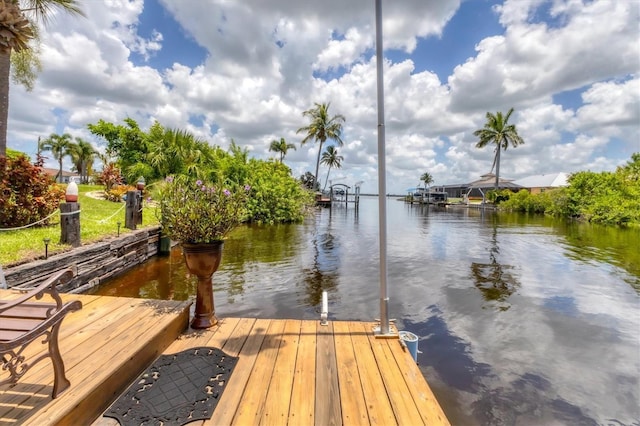 view of dock with a water view