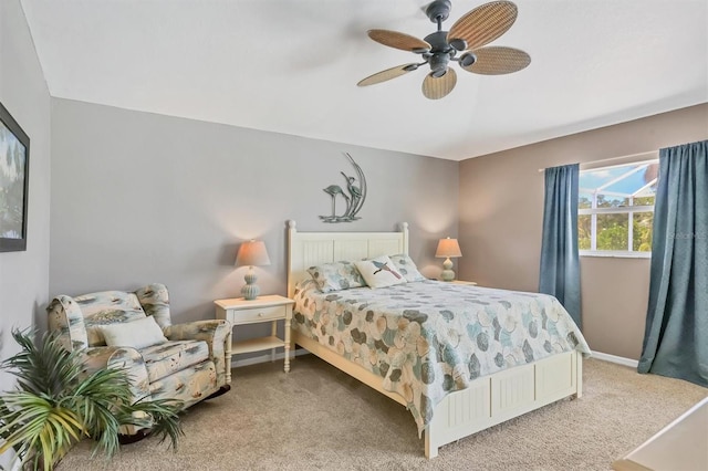 bedroom with ceiling fan and carpet